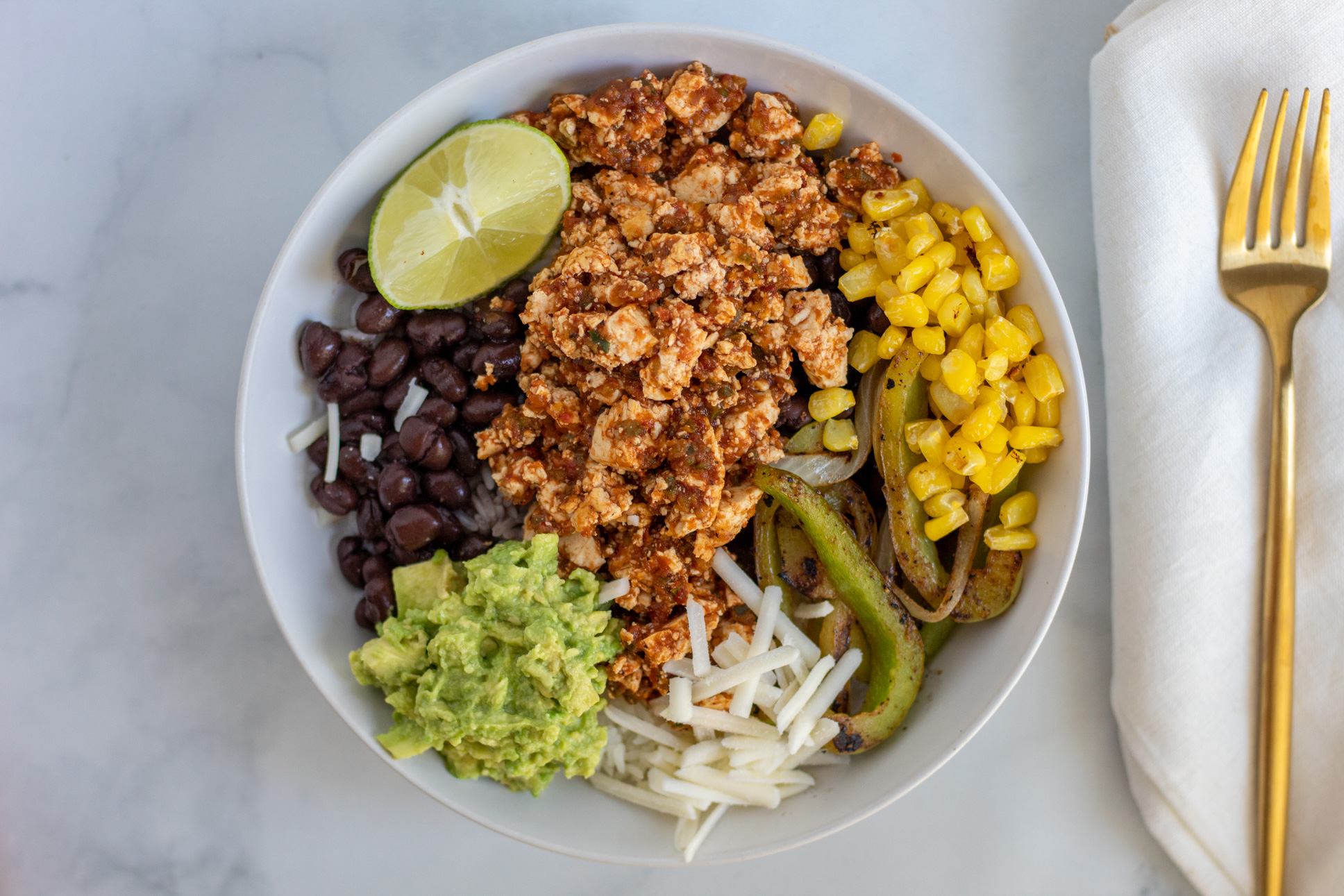 Best Vegan Protein Sources plant based bowl with rice, beans, and tofu