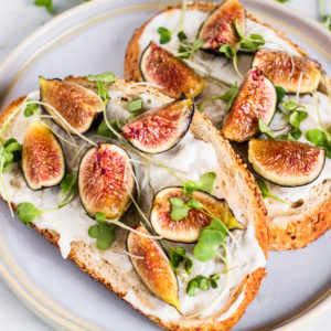 Fig and vegan cream cheese toast and microgreens