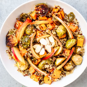 Maple Balsamic Harvest Bowl with brussel sprouts, sweet potatoes, quinoa, and apple