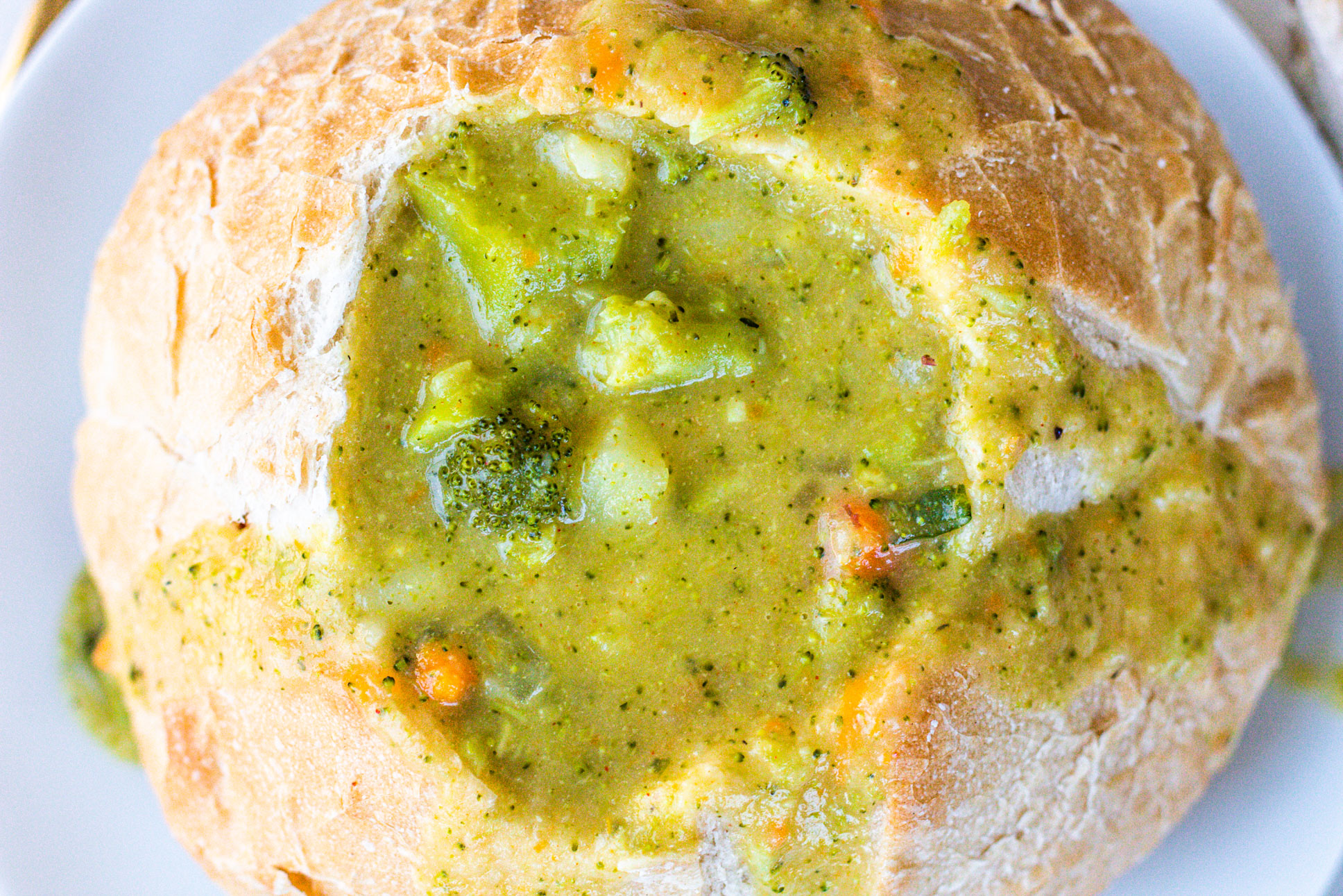 Vegan Broccoli Cheddar Soup in a bread bowl