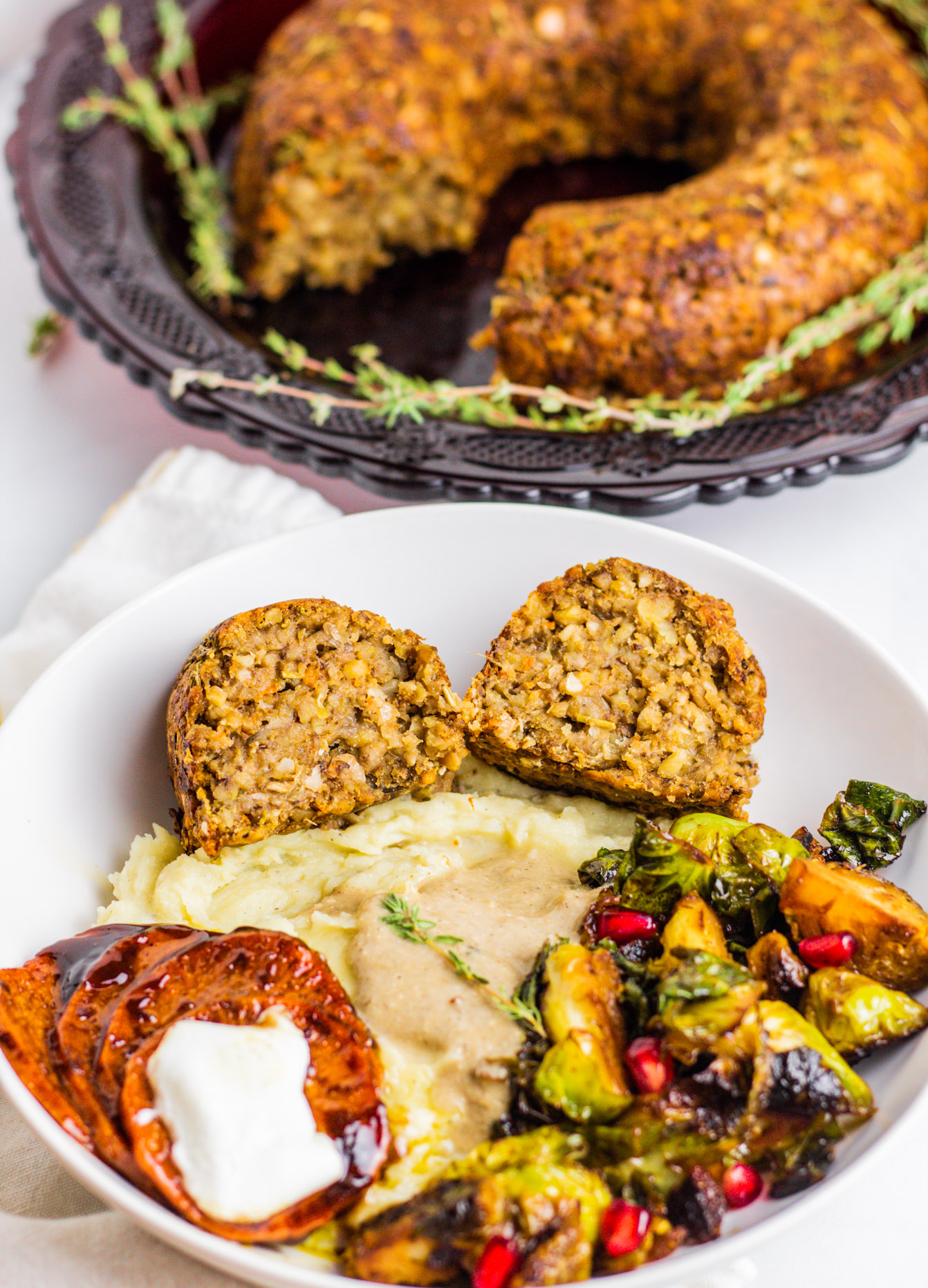 Vegan Holiday Roast plate with mashed potatoes and gravy