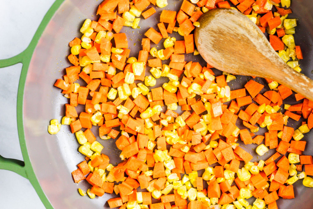 vegan egg drop soup with carrots and corn