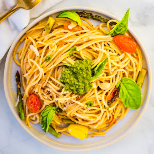 Springtime Pasta Vegan sauce with plantbased butter, garlic, asparagus, cherry tomatoes, and lemon