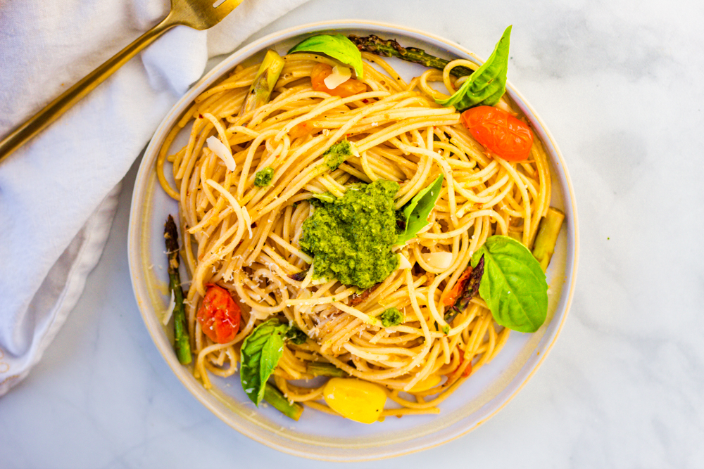 Springtime Pasta Vegan sauce with plantbased butter, garlic, asparagus, cherry tomatoes, and lemon