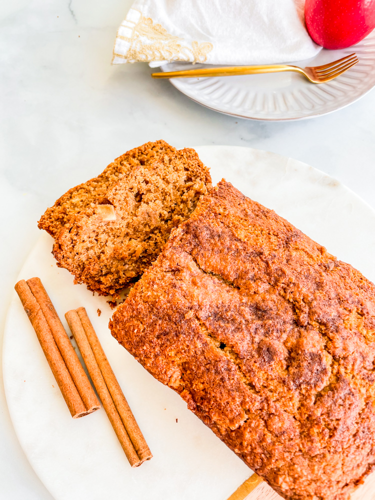 Vegan Cinnamon Apple Bread , cinnamon sticks and apple.